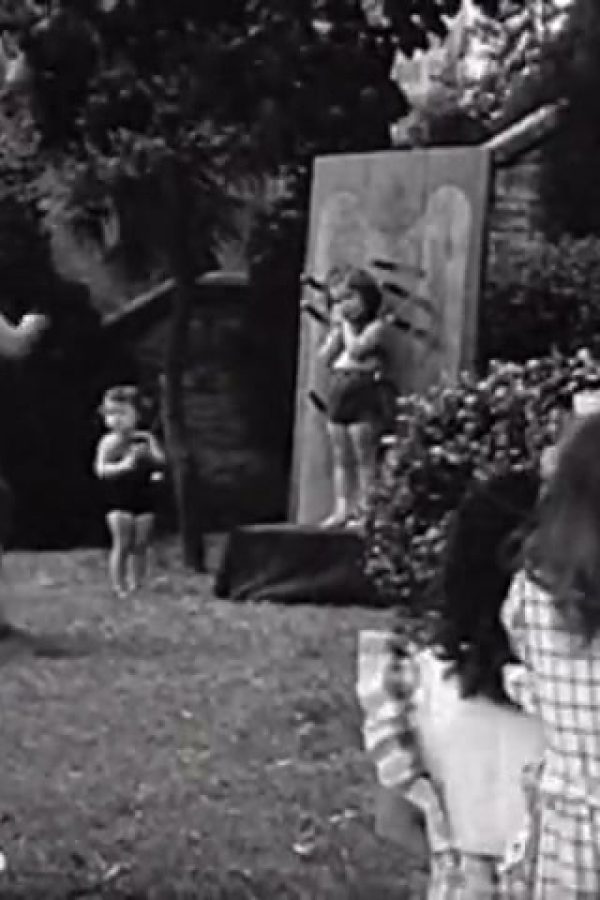 [Knife-Thrower and Children]